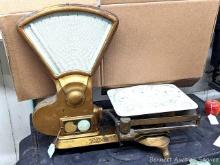 Located in basement, bring help to remove. Storekeeper's counter scale by Toledo. Unit measures