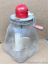Located in basement, bring help to remove. Art Deco era butter churn has a cheery red top and handle