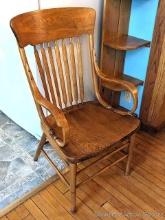 Very sturdy kitchen chair with arms. 41" tall x 22" wide x 19" deep. Heirloom quality.