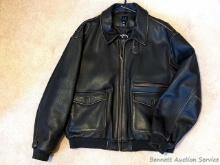 Nice leather bomber-style jacket is men's size XL and in very good condition.
