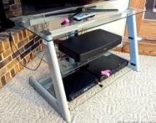 Bell'O metal and glass entertainment stand with 3 glass shelves. Good condition. Stand only,
