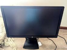 HP Elite Display E271i monitor screen, screen measures 27" on the diagonal. It sits on a fully