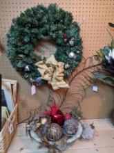 Christmas wreath measures 21", center piece with footed bowl and large orbs and metal feather wall