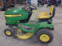 JD  X304 42" 4 WHEEL STEER RIDING MOWER, 725 HRS