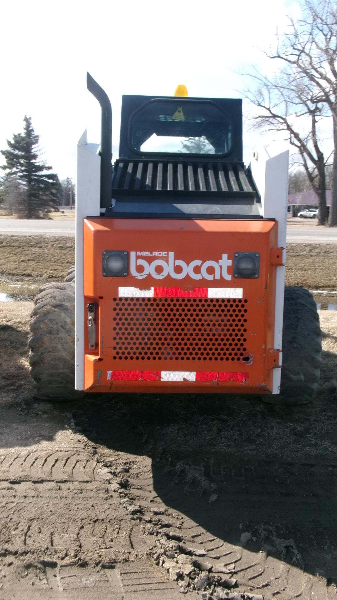 1993 MELROE BOBCAT 943 SKID LOADER, dirt, & 7' snowbucket, 42" forks, 8' brushaux. hydraulics, +