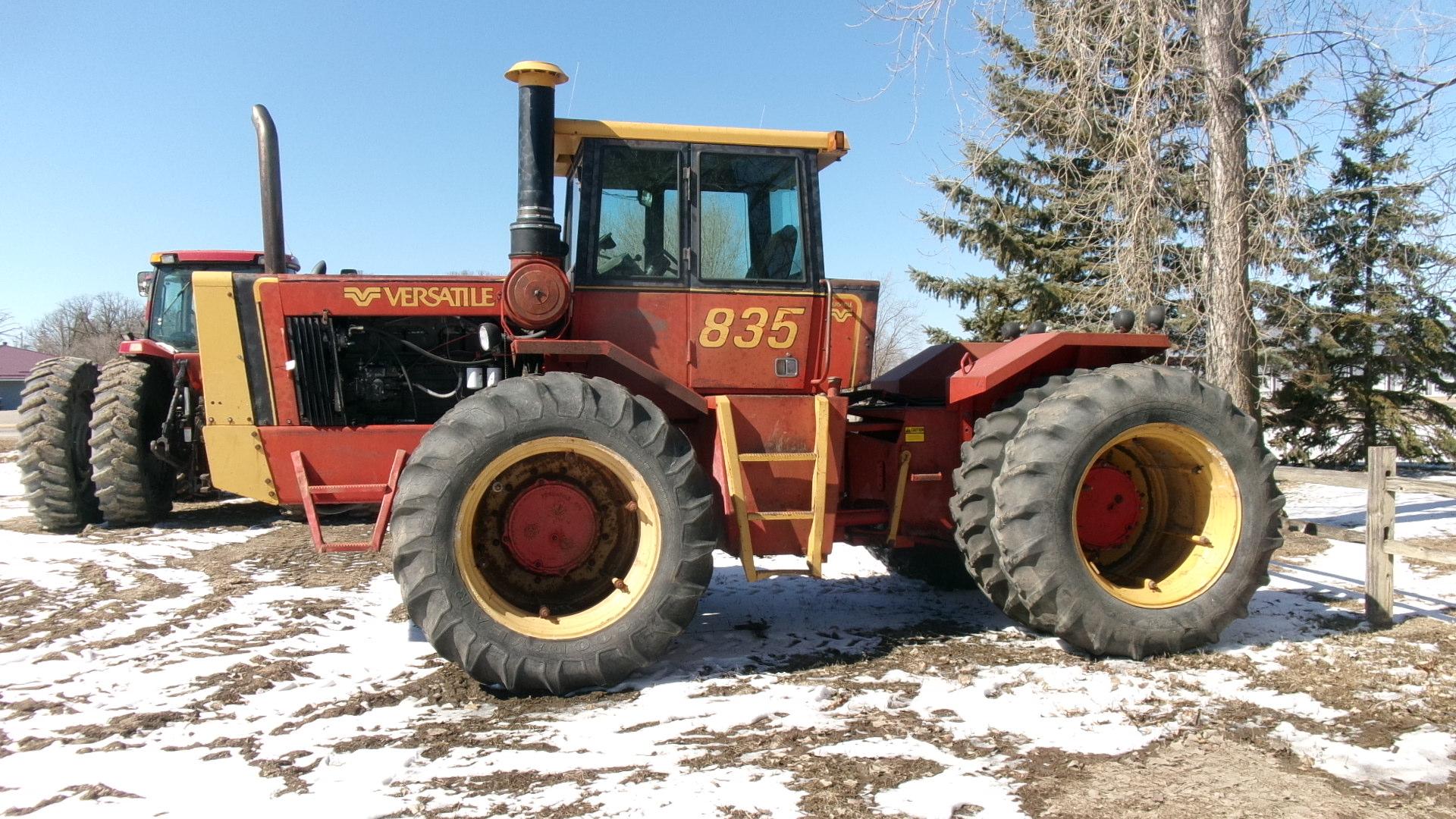 1982 VERSATILE 835 4WD, 4 remotes, 18.4 x 38" banddualed, shows 2055 hrs.,  ph. Gary @ 686-6855