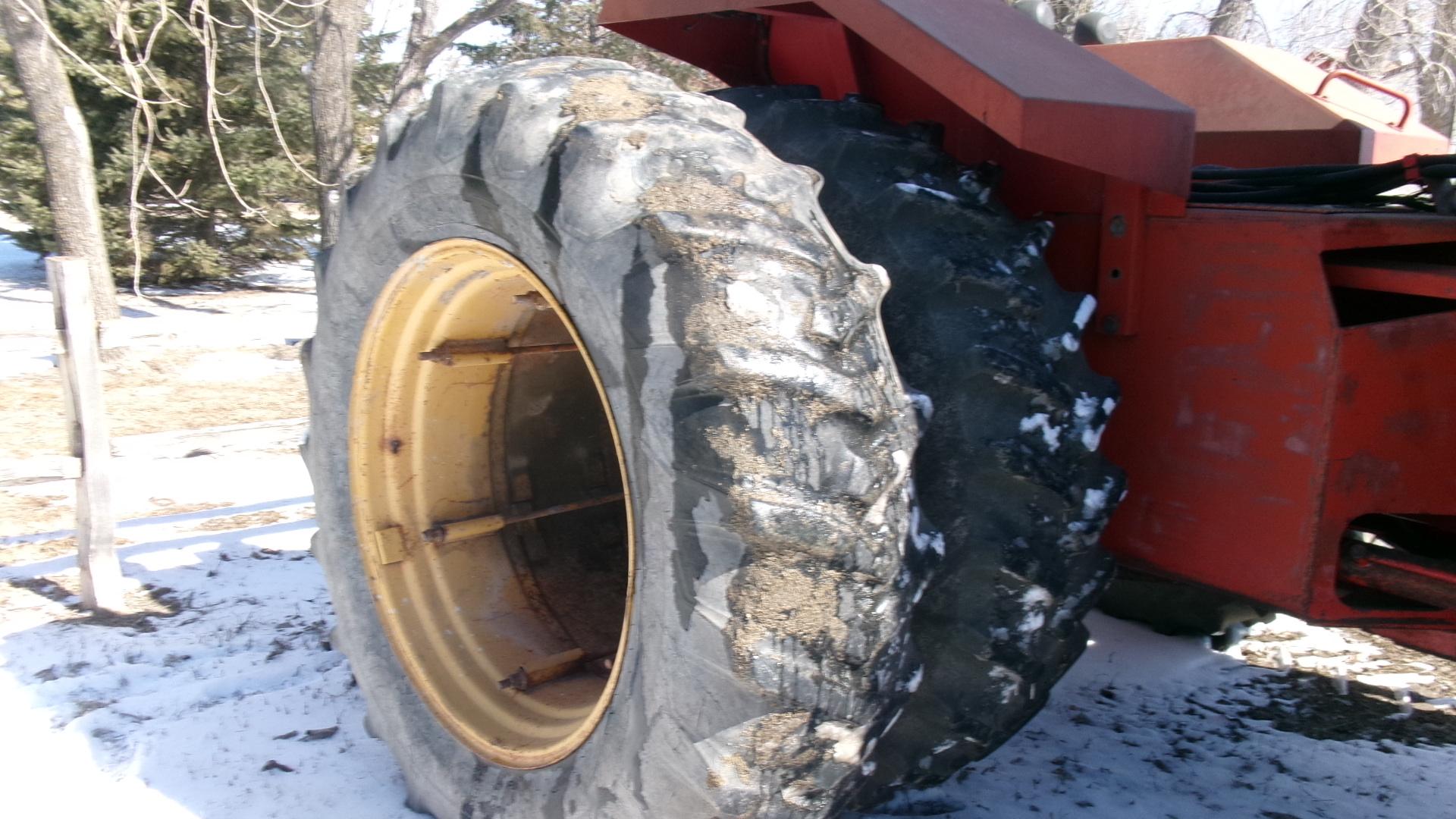 1982 VERSATILE 835 4WD, 4 remotes, 18.4 x 38" banddualed, shows 2055 hrs.,  ph. Gary @ 686-6855