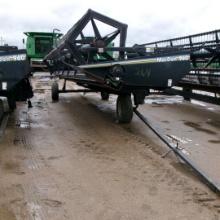 1994 30' MACDON 960 RIGID HEAD, batt reel, canvasses replaced, transport, 9600 J.D hook ups, shedded