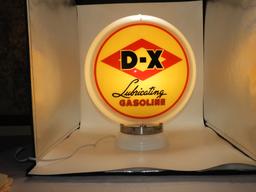 DX lubricating gasoline, red and tan