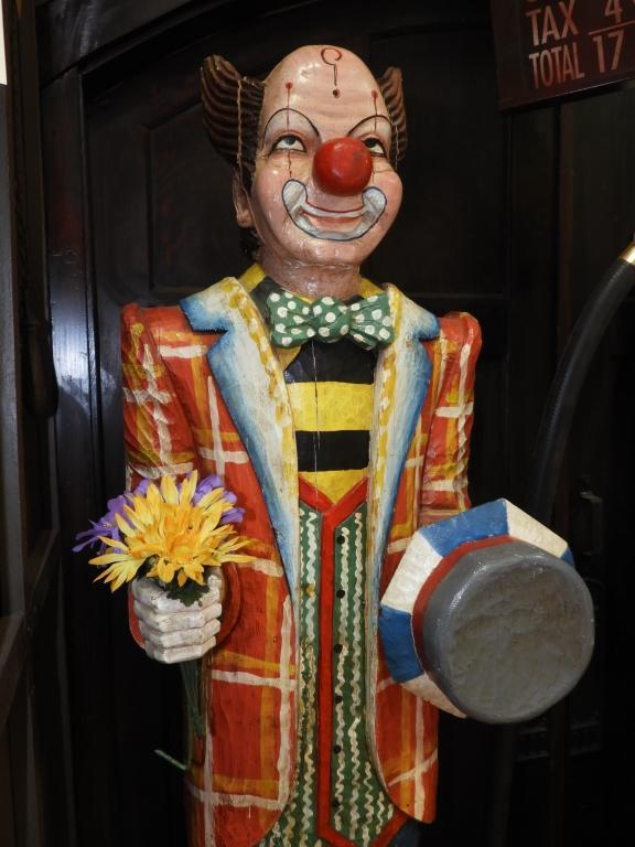 Carved wood carnival clown, 23"x80"