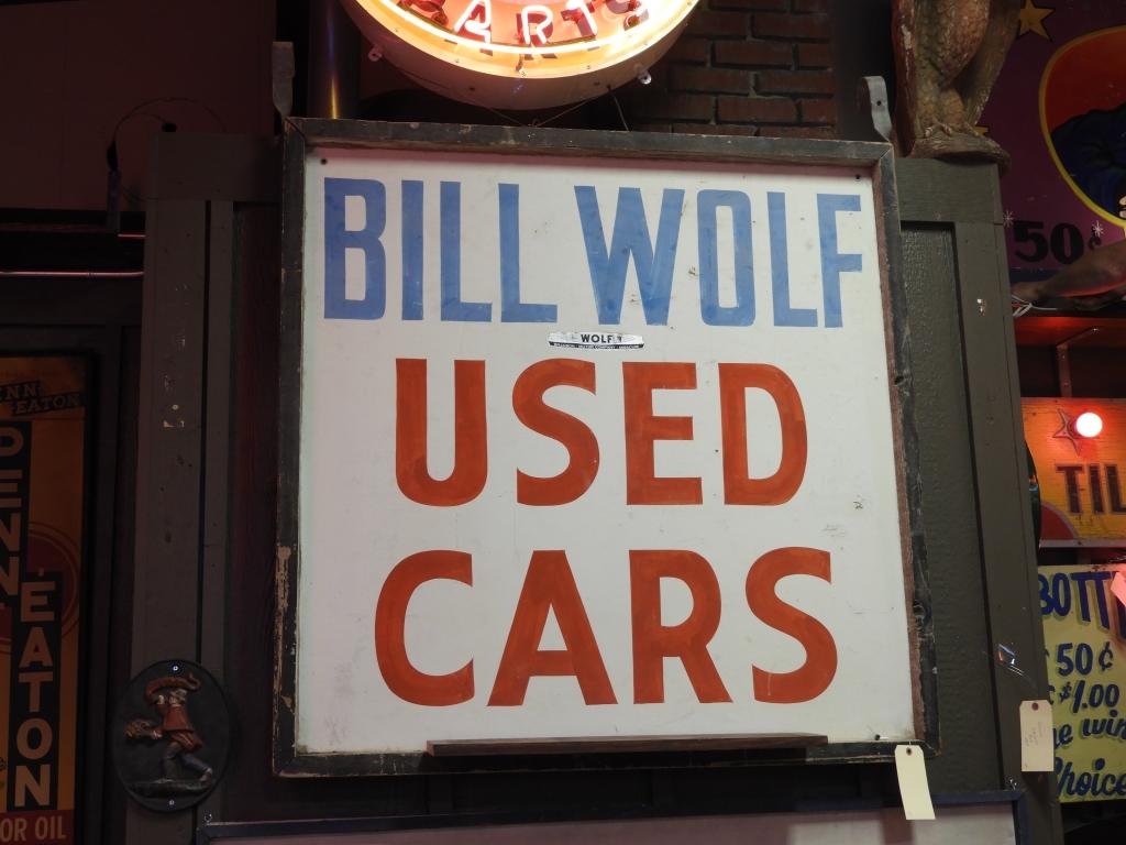 Bill Wolff Used Cars hand painted wooden sign, 4'x