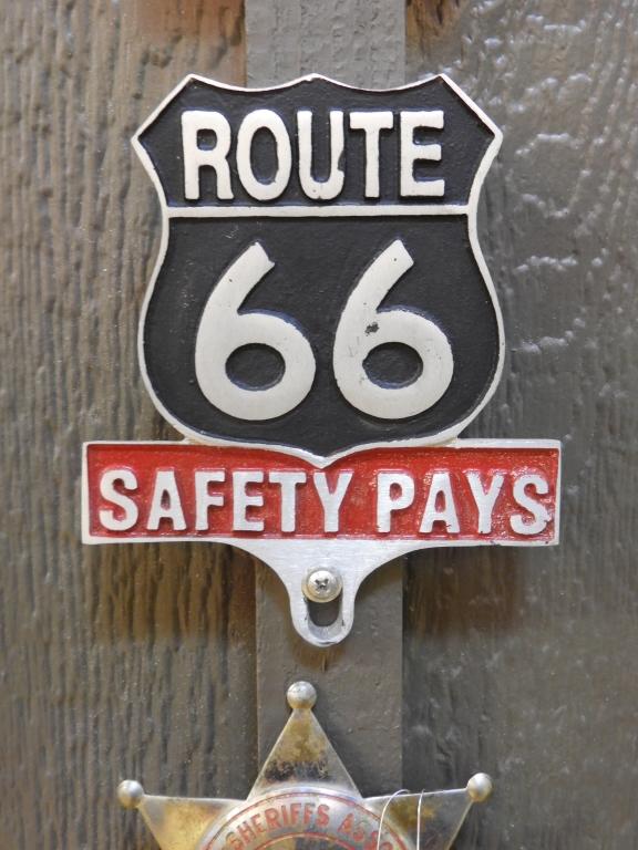 Route 66 Safety Pays license plate topper