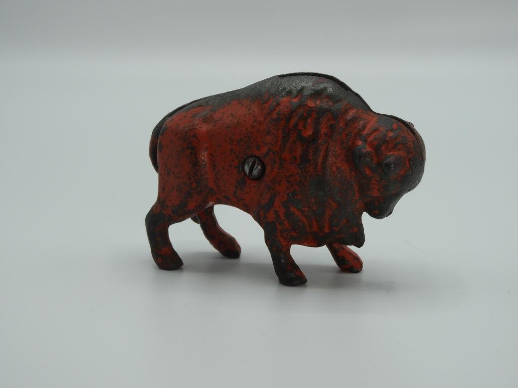 Cast iron buffalo bank, 4"Wx3"T