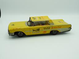 Tin Yellow 66 taxi, 10"Lx3"T