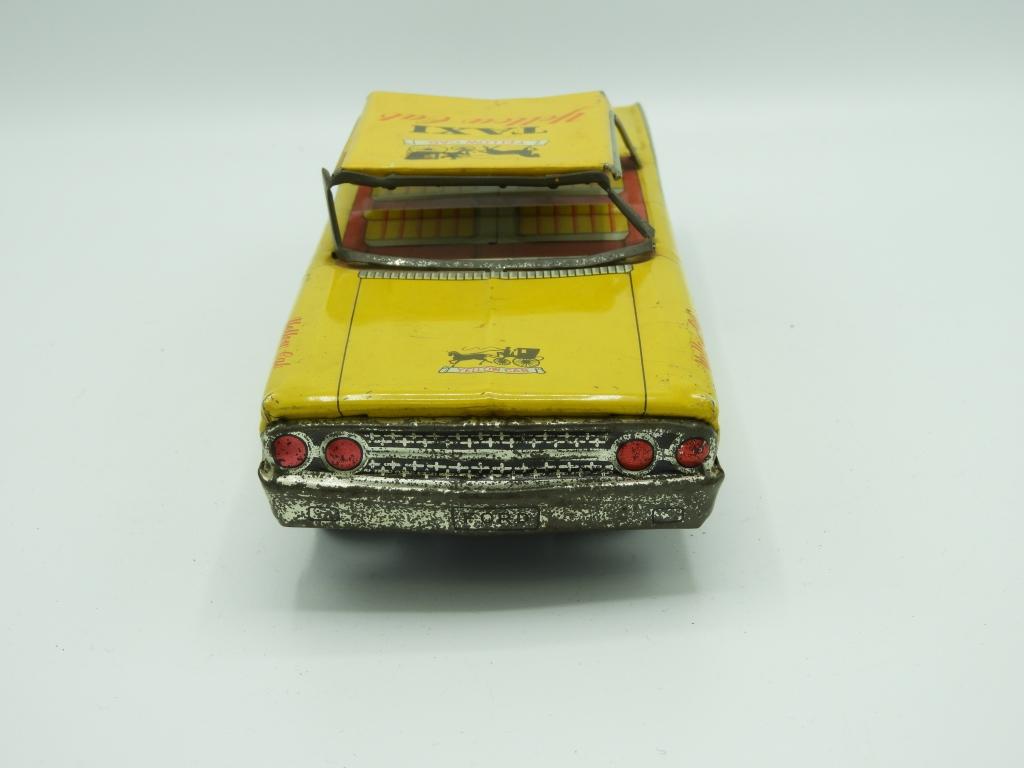 Tin Yellow 66 taxi, 10"Lx3"T