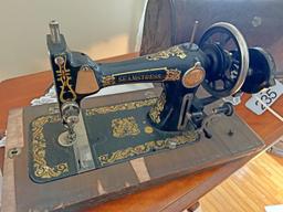 Antique Seamstress Sewing Machine