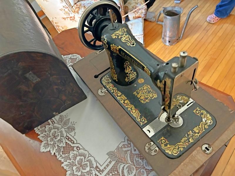 Antique Seamstress Sewing Machine