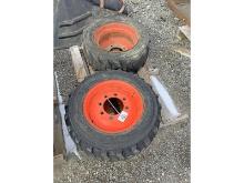 2 - 10-16.5 Skid Steer Tires on 8 Bolt Bobcat Rims