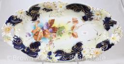 R.S. Prussia cobalt celery tray with pierced handles and floral border mold, 13"l x 7"w, purple