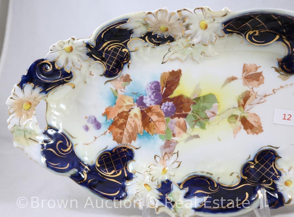 R.S. Prussia cobalt celery tray with pierced handles and floral border mold, 13"l x 7"w, purple