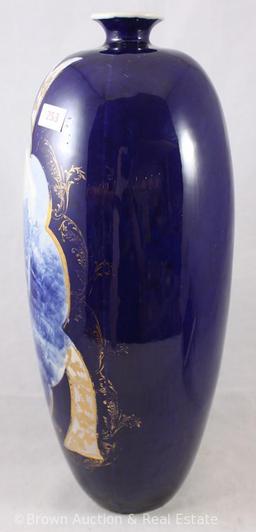 Unm. 14" tall cobalt scenic vase, woman holding onto her hat, gold accents