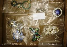 Box lot of costume jewelry, pins and brooches