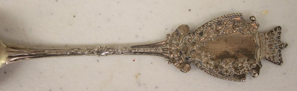 (4) Sterling silver souvenir spoons incl. Albany; Yellowstone; Toronto Cana