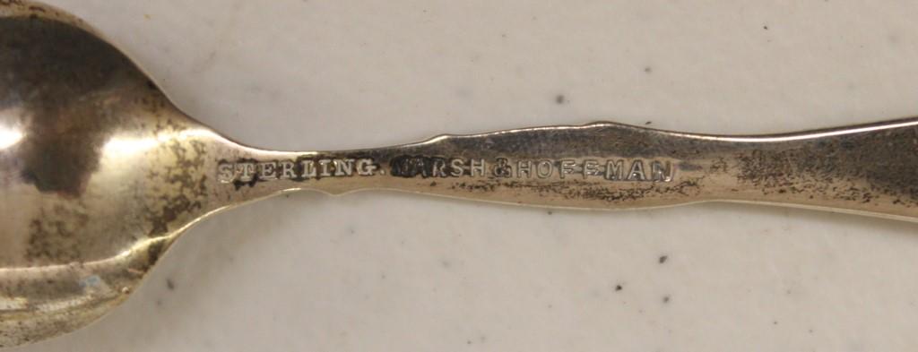 (4) Sterling silver souvenir spoons incl. Albany; Yellowstone; Toronto Cana