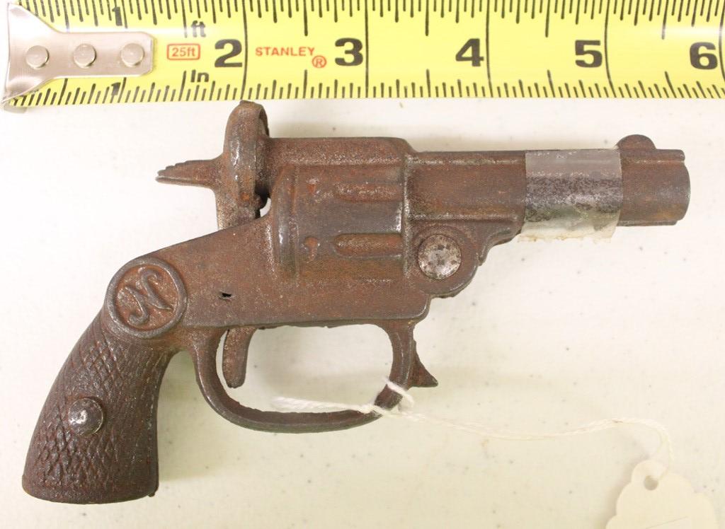 Vintage cast cap gun, "N"