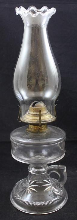 (2) Clear thumb-hold kerosene lamps (1 with imperfect base)