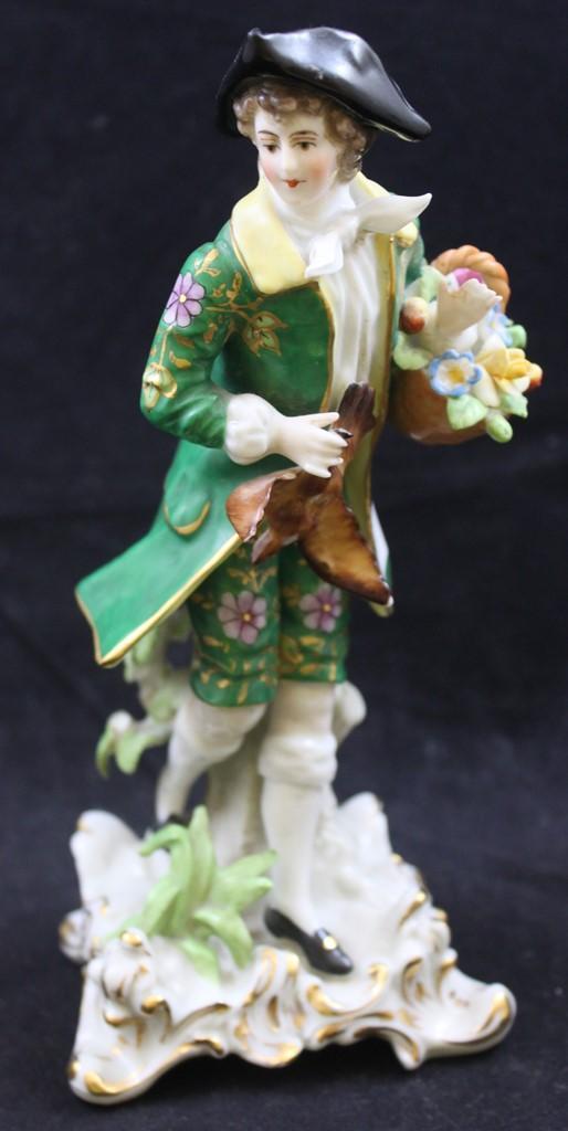 Pr. 7.5"h figurines, Victorian man and woman holding their catch of the day and baskets of flowers