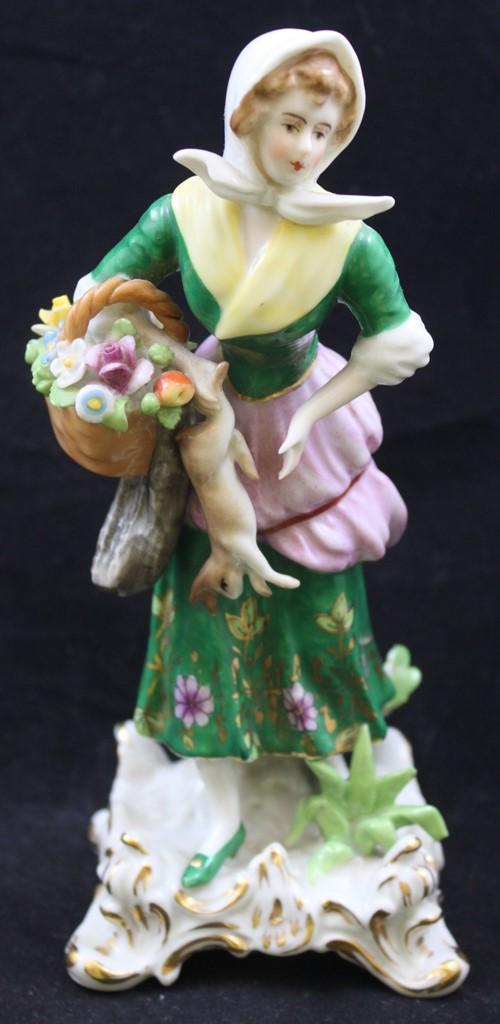 Pr. 7.5"h figurines, Victorian man and woman holding their catch of the day and baskets of flowers