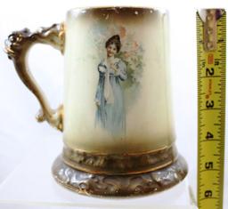 (2) Mrkd. Owen Minerva 5"h mugs with Griffin handles, each mug features portrait of lady