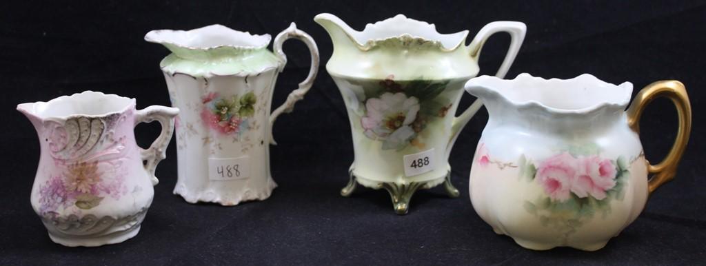 (4) Assorted handpainted porcelain creamers, all floral designs, 1-mrkd. RS Prussia, 1 with embossed