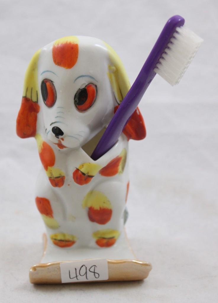 (3) Vintage novelty toothbrush holders incl. dog, Bell hop and child playing horn