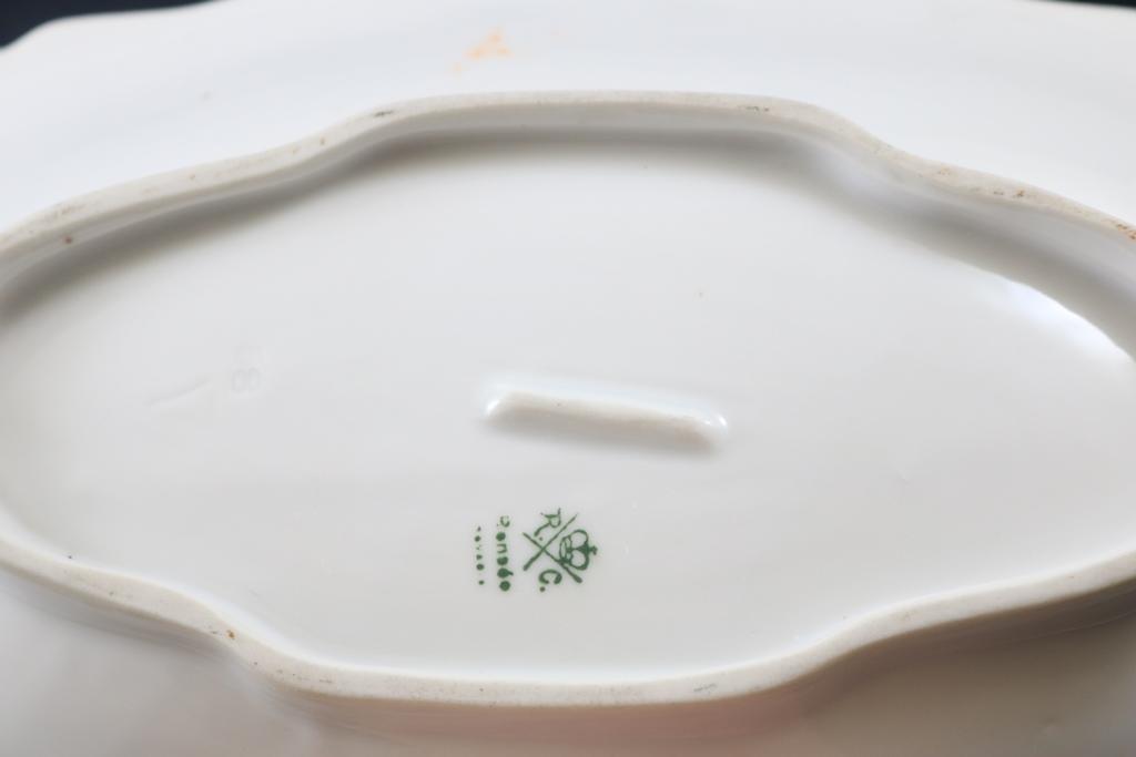 (2) Hand Painted celery trays: 1-decorated with white flowers, nice border mold in shades of