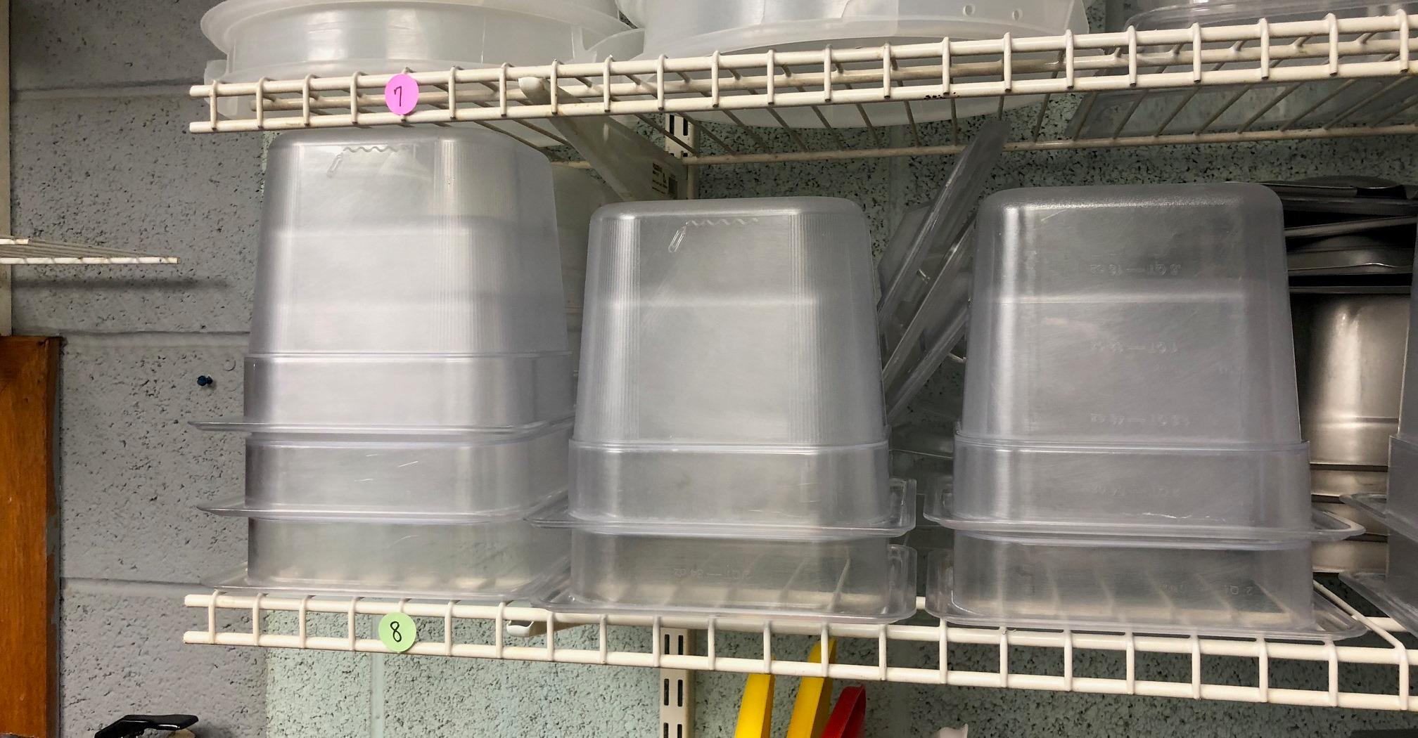 Third Shelf of pans, trays, etc. - mostly plastic