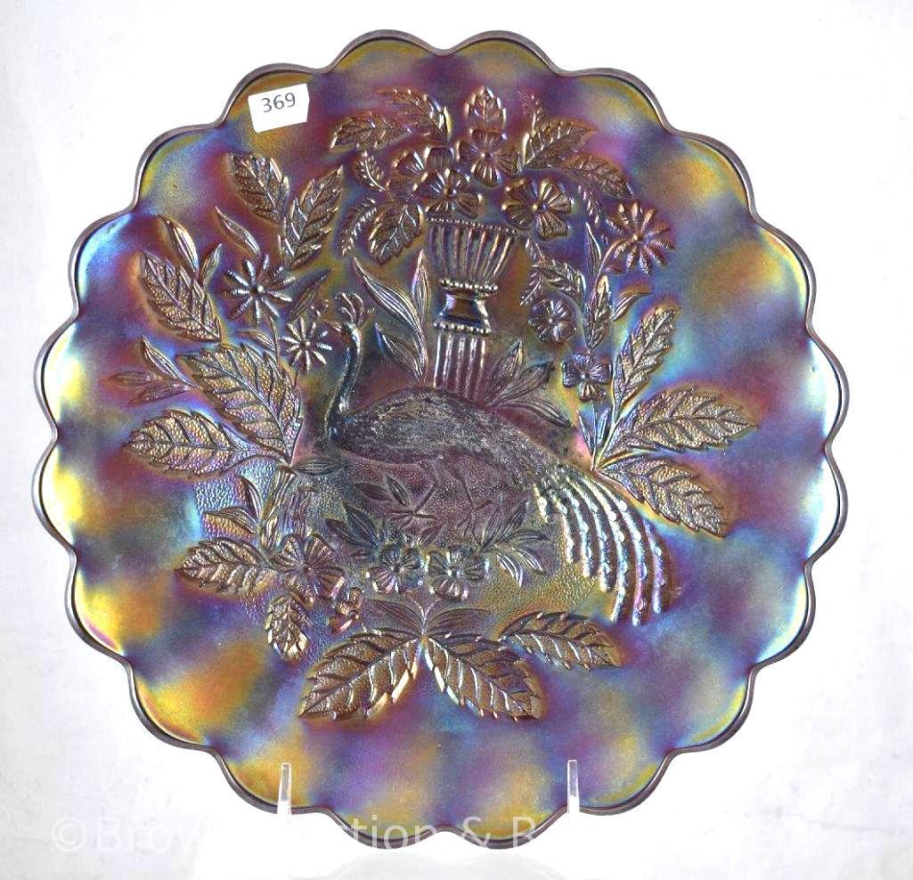 Carnival Glass Peacock and Urn 10.5"d chop plate, purple