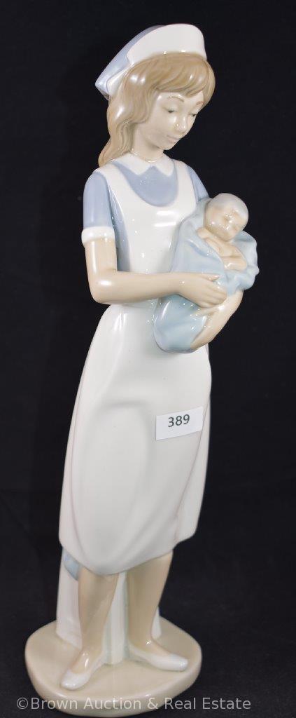 (2) NAO porcelain figurines made by Lladro: Nurse holding baby and Girl with rabbit