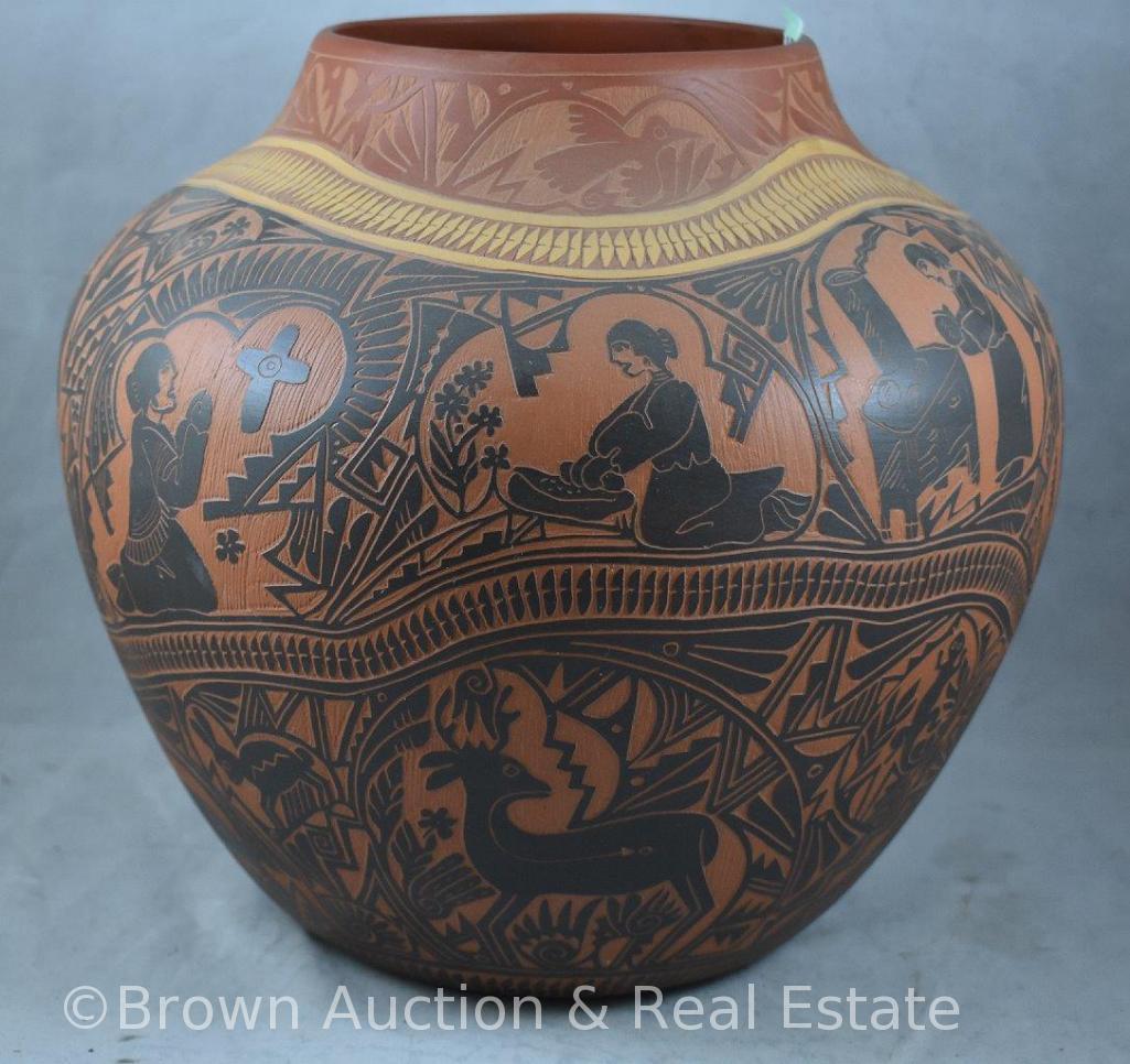 S.R. Garcia, Laguna, NM 11"h pot, nice hand etched design depicting everyday life and animals