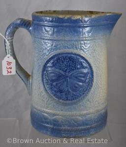 (2) Blue and white Stoneware pitchers: Butterflies, 8.5"h (hairlines); Cows, 8" (repaired top rim)