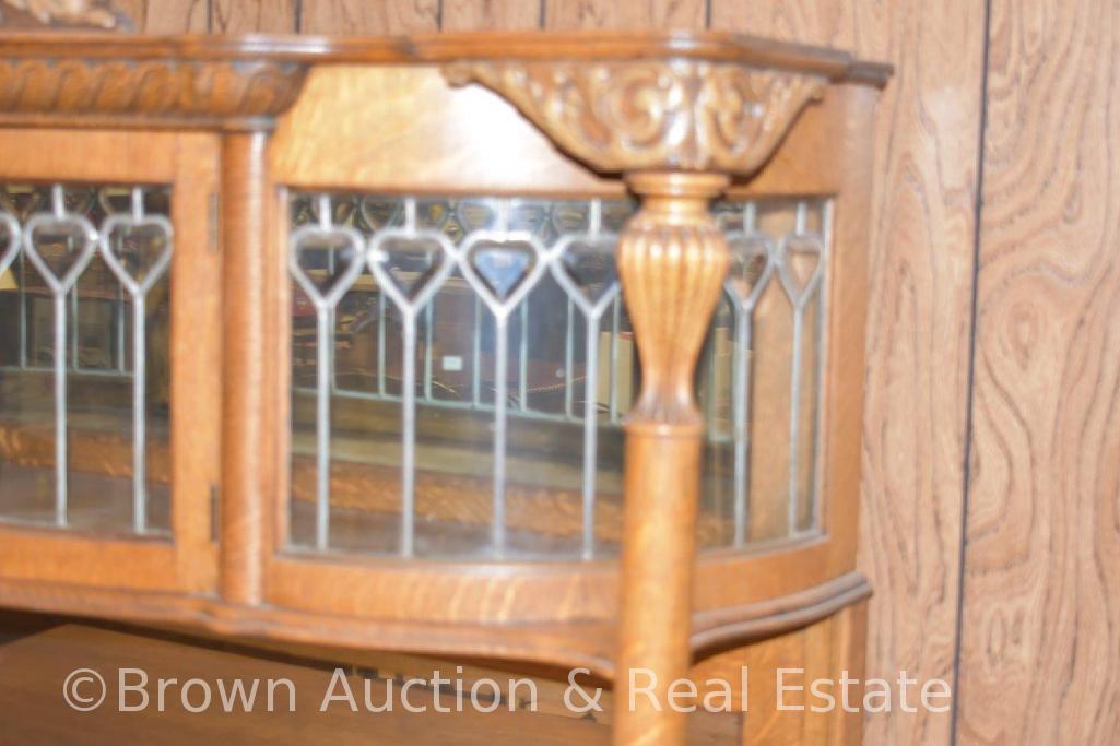 Large Oak sideboard/buffet, top & bottom have curved leaded glass doors, other drawers for storage,