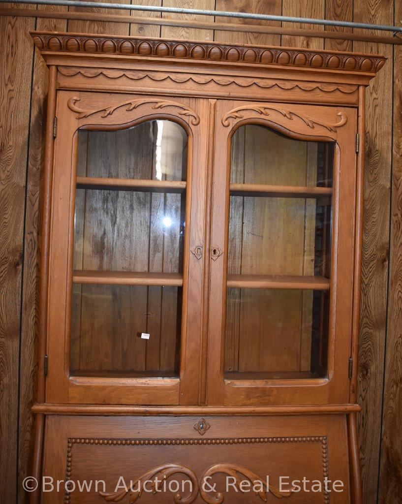 Secretary slant front desk, bookcase top with dbl. glass doors, 3 lower drawers, 6'11" tall, overall