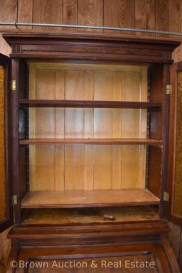 Cylinder front roll desk, drawers and storage below, top has been added with shelves behind dbl.