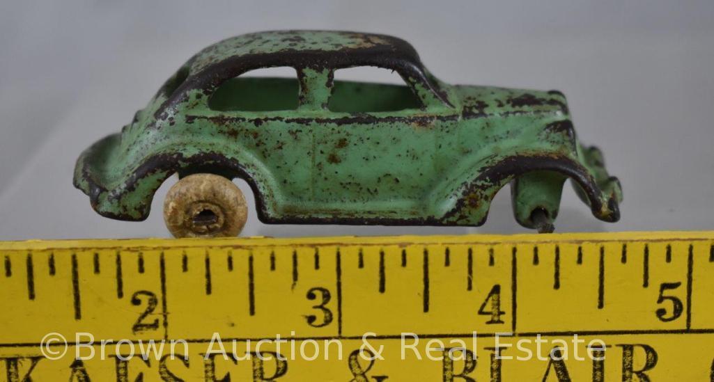 (4) Assorted Cast Iron cars