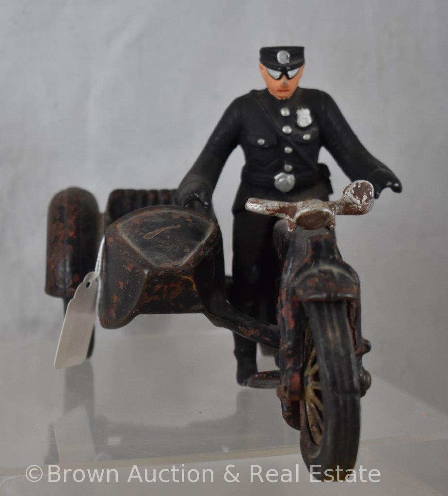 Hubley cast iron motorcycle with side car and police officer rider, 9"l