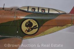 Marx Toys pressed steel Camouflage airplane, 12" wing span, has working bomb door, but no bombs