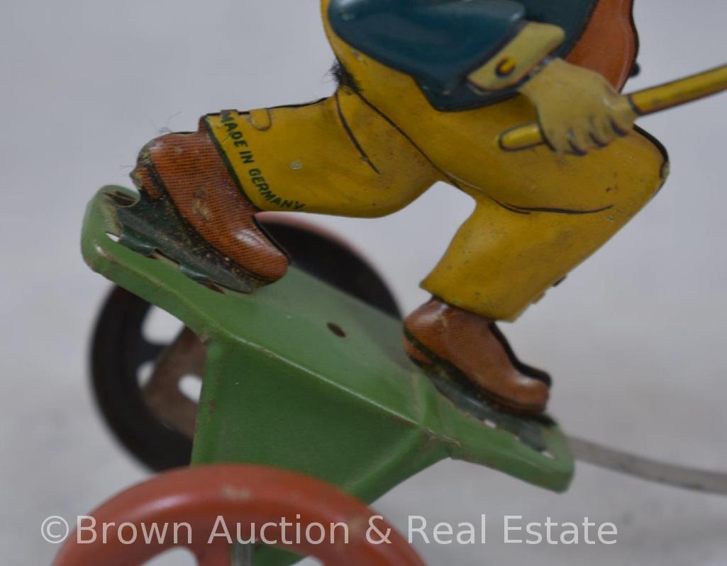 Mrkd. Made in Germany tin wind-up toy, fighting husband (armed with cane) and wife (armed with