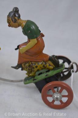 Mrkd. Made in Germany tin wind-up toy, fighting husband (armed with cane) and wife (armed with