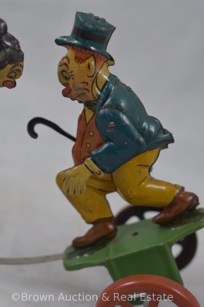 Mrkd. Made in Germany tin wind-up toy, fighting husband (armed with cane) and wife (armed with